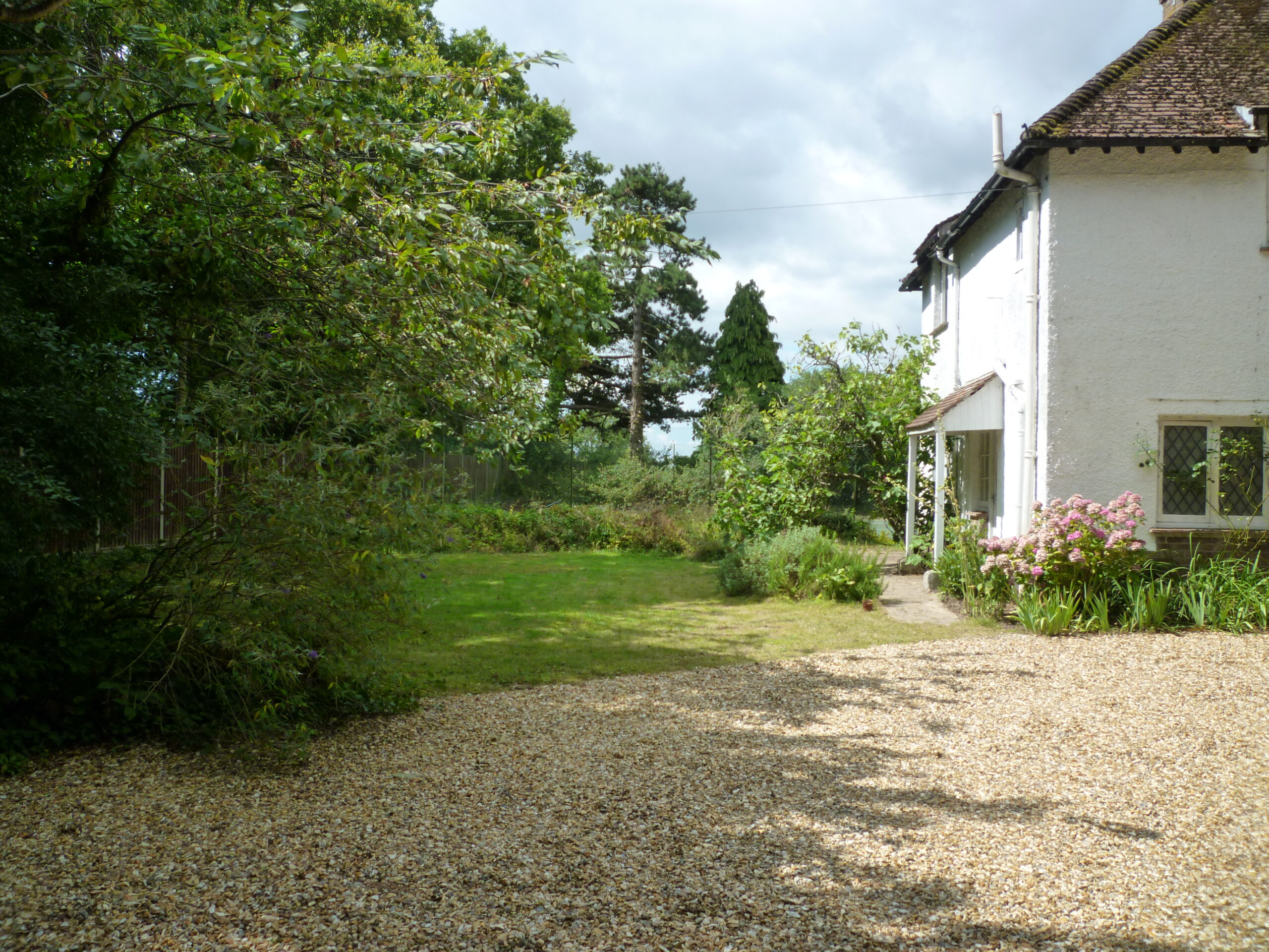 Dingle-House-and-Back-Lawn The Dingle